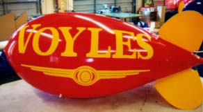 Advertising Blimps - Voyle's logo - Big balloons build business!